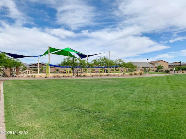 view of community featuring a lawn