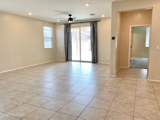 unfurnished room featuring light tile patterned flooring, ceiling fan, recessed lighting, and baseboards