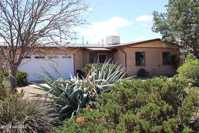 1208 E Flynn Jans Ct, Pearce, AZ 85625 - single story home with central AC unit and an attached garage