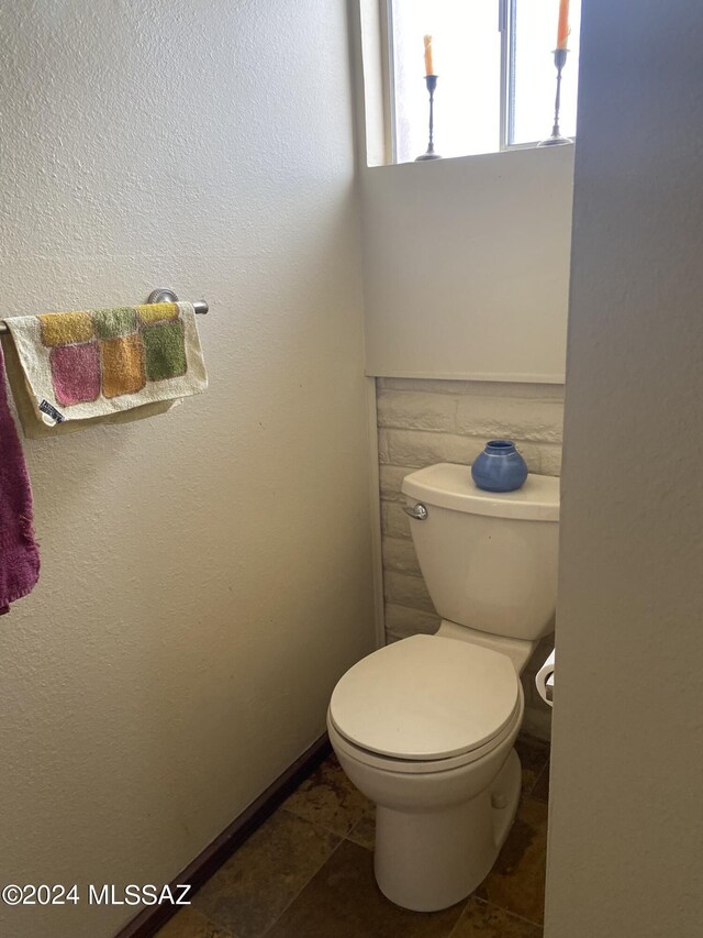 1208 E Flynn Jans Ct, Pearce, AZ 85625 - bathroom with tile patterned floors and toilet