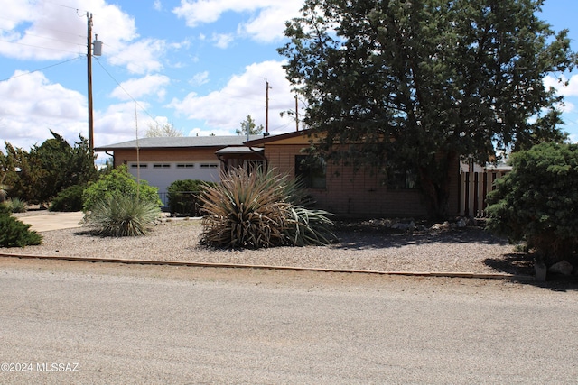 1208 E Flynn Jans Ct, Pearce, AZ 85625 - view of front of property featuring a garage