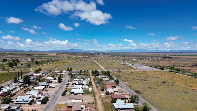 1208 E Flynn Jans Ct, Pearce, AZ 85625 - drone / aerial view featuring a mountain view