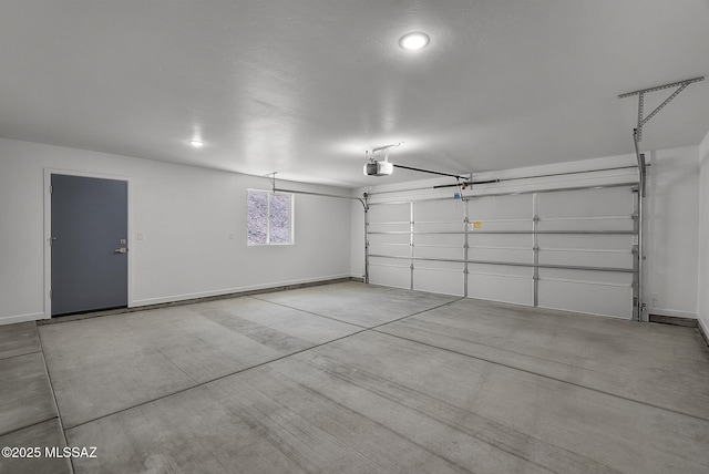 172 Vereda Cabrilla Ln, Rio Rico, AZ 85648 - garage with a garage door opener and baseboards