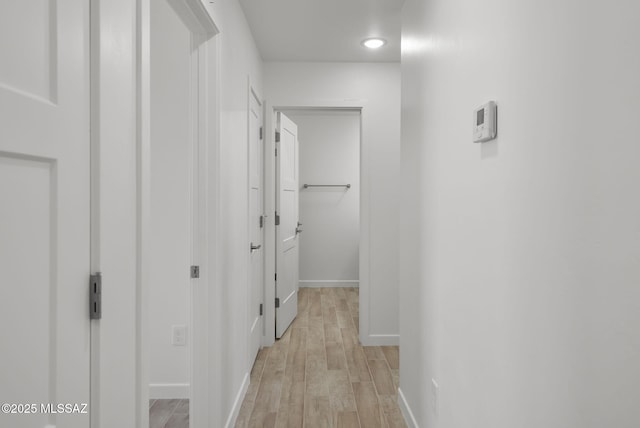 172 Vereda Cabrilla Ln, Rio Rico, AZ 85648 - hallway featuring baseboards and light wood-style floors