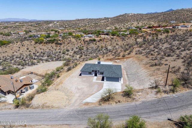 172 Vereda Cabrilla Ln, Rio Rico, AZ 85648 - bird's eye view with view of desert, a mountain view, and a rural view