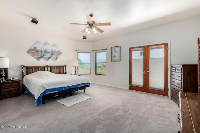 5498 N Desert Wood Pl, Tucson, AZ 85745 - bedroom with french doors, carpet, and ceiling fan