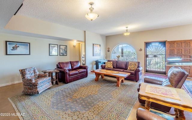 living room featuring a textured ceiling