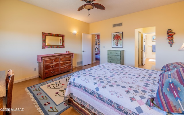 bedroom with visible vents, a ceiling fan, baseboards, and ensuite bathroom
