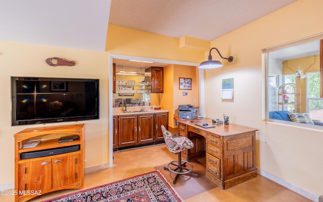 home office featuring baseboards