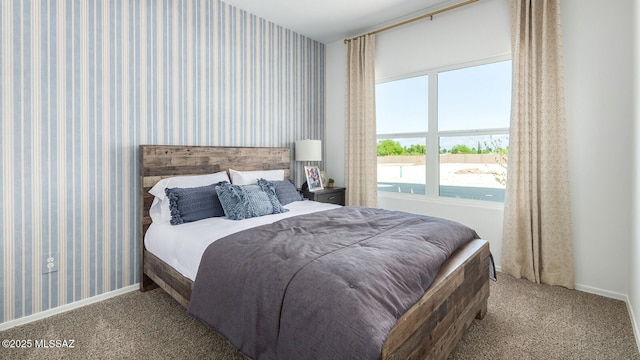 9828 E Gray Hawk Dr, Tucson, AZ 85730 - carpeted bedroom featuring baseboards, wallpapered walls, and multiple windows