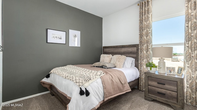 9828 E Gray Hawk Dr, Tucson, AZ 85730 - carpeted bedroom featuring baseboards