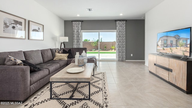 9828 E Gray Hawk Dr, Tucson, AZ 85730 - living room with light tile patterned floors, recessed lighting, and visible vents