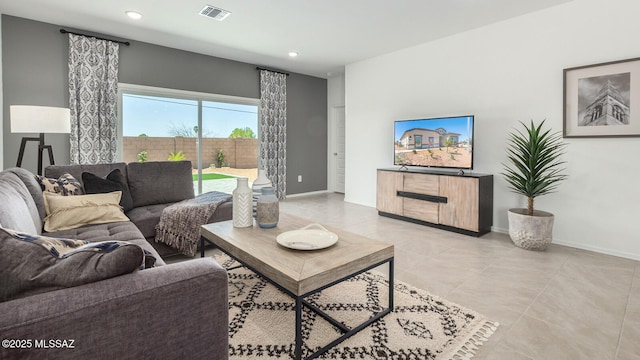 9828 E Gray Hawk Dr, Tucson, AZ 85730 - living area featuring light tile patterned flooring, visible vents, recessed lighting, and baseboards