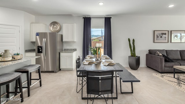 9828 E Gray Hawk Dr, Tucson, AZ 85730 - dining space with light tile patterned floors and recessed lighting