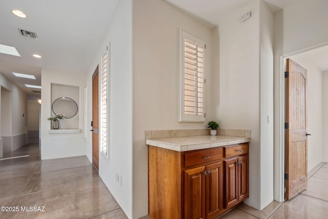 6340 N Placita Alta Reposa, Tucson, AZ 85750 - hallway with light tile patterned floors, recessed lighting, and visible vents