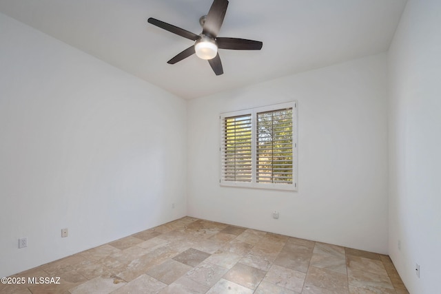 6340 N Placita Alta Reposa, Tucson, AZ 85750 - empty room featuring a ceiling fan and stone finish floor