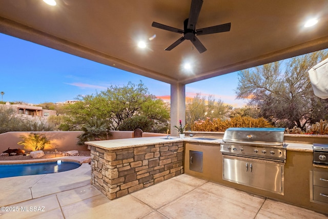 6340 N Placita Alta Reposa, Tucson, AZ 85750 - view of patio / terrace featuring exterior kitchen, a ceiling fan, and a grill