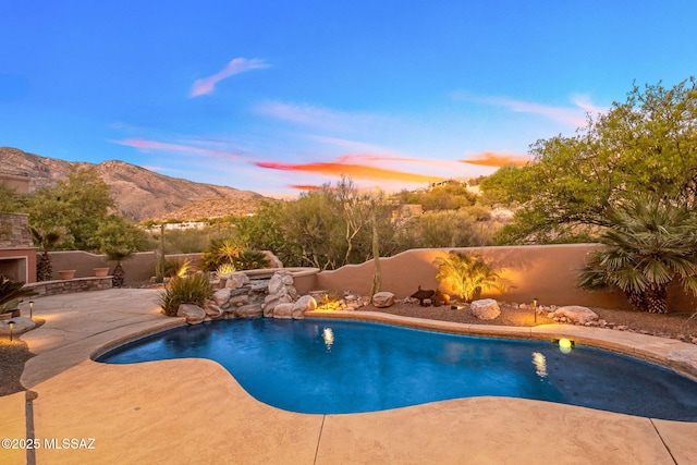 6340 N Placita Alta Reposa, Tucson, AZ 85750 - view of swimming pool featuring a fenced backyard, a patio area, a mountain view, and a fenced in pool