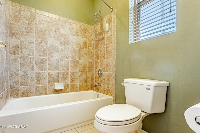 bathroom with toilet and shower / tub combination