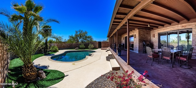 view of pool featuring a patio, a fenced in pool, and a fenced backyard