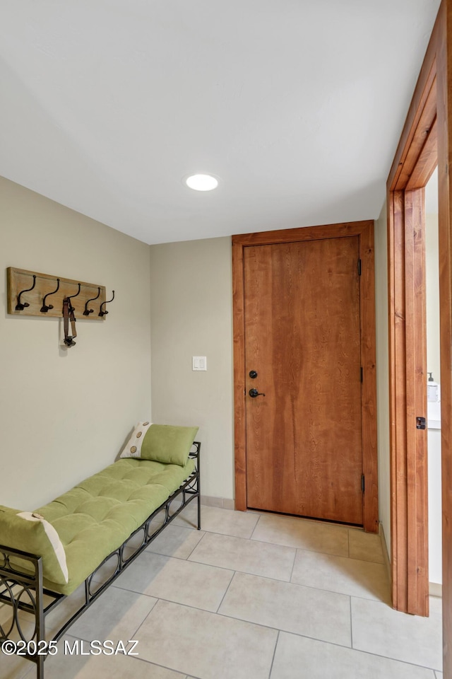entrance foyer featuring light tile patterned floors