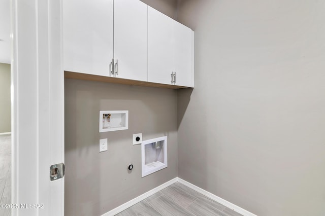 3000 S Smokin Pistol Way, Tucson, AZ 85713 - laundry room with hookup for an electric dryer, baseboards, hookup for a washing machine, and cabinet space