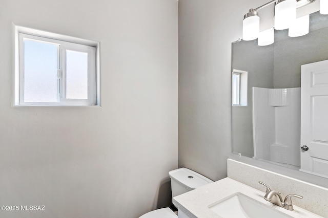 3000 S Smokin Pistol Way, Tucson, AZ 85713 - bathroom with plenty of natural light, toilet, and vanity