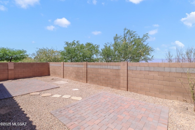 view of patio with a fenced backyard