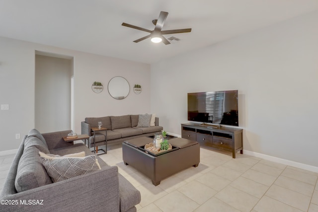 living room with light tile patterned floors, ceiling fan, baseboards, and visible vents