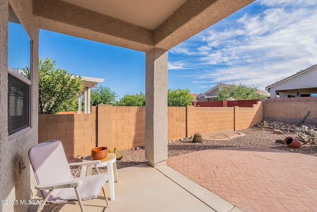 view of patio with a fenced backyard