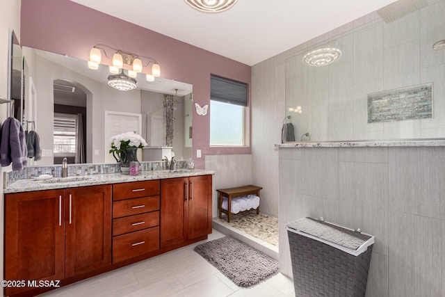 6505 W Sugar Pine Trl, Tucson, AZ 85743 - bathroom with a walk in shower and double vanity