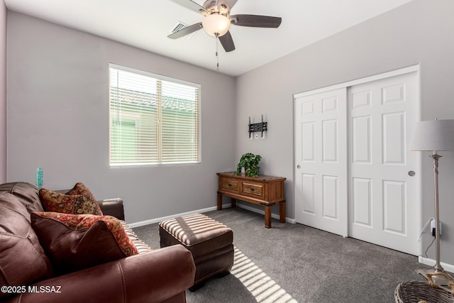 6505 W Sugar Pine Trl, Tucson, AZ 85743 - carpeted living area with ceiling fan and baseboards