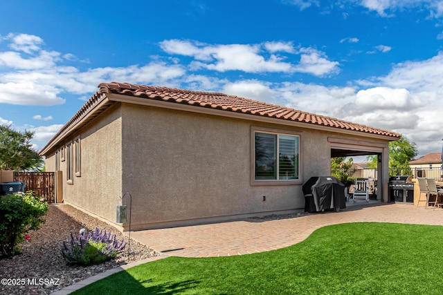 6505 W Sugar Pine Trl, Tucson, AZ 85743 - rear view of house with a patio area, stucco siding, and a tiled roof