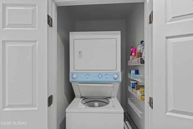 washroom with laundry area and stacked washer and dryer