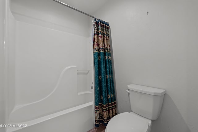 full bath with toilet and shower / bath combo