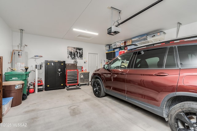 garage with a garage door opener and water heater