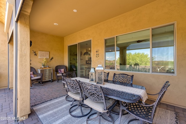 view of patio featuring outdoor dining space