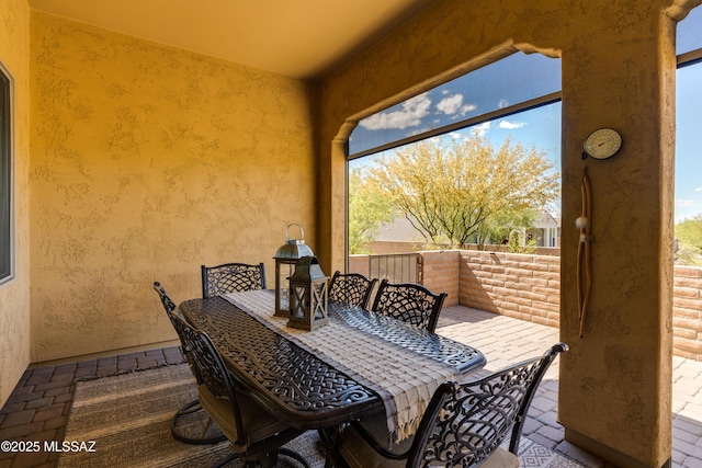exterior space with outdoor dining space