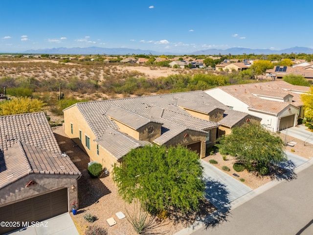 aerial view featuring a residential view and a mountain view