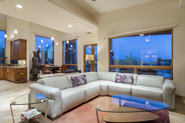 living area with recessed lighting