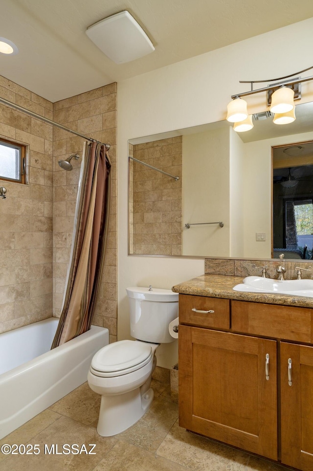 full bathroom featuring vanity, shower / bath combo, toilet, and visible vents