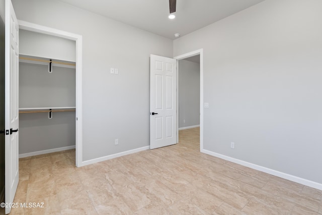 unfurnished bedroom with baseboards, recessed lighting, ceiling fan, and a closet