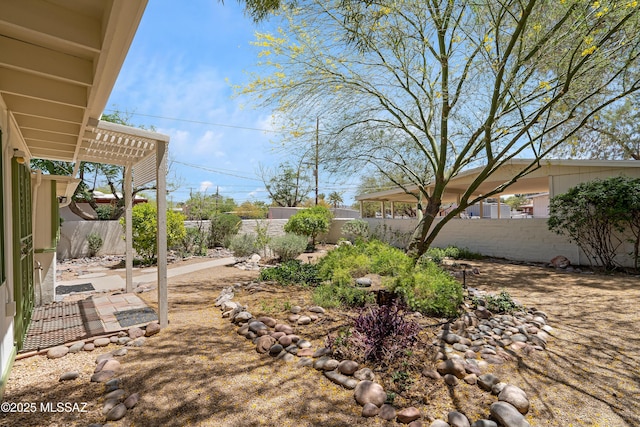 view of yard featuring a fenced backyard