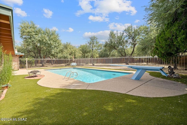 view of pool featuring a fire pit, a fenced backyard, a fenced in pool, a patio area, and a lawn