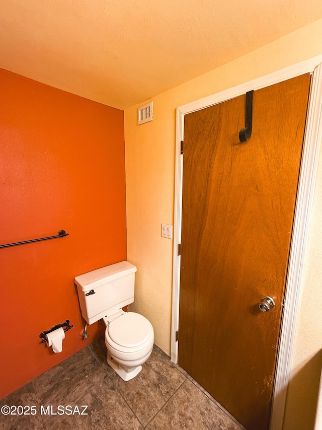 1350 E Goosetree Ln, Safford, AZ 85546 - bathroom with toilet, tile patterned floors, and visible vents