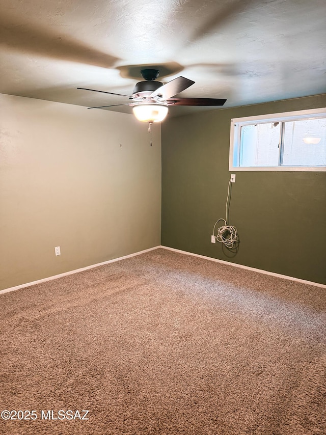 1350 E Goosetree Ln, Safford, AZ 85546 - spare room with carpet floors, ceiling fan, and baseboards