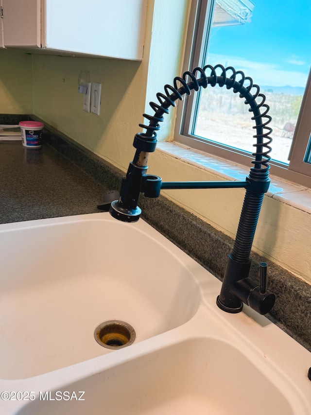 1350 E Goosetree Ln, Safford, AZ 85546 - room details with white cabinets and a sink
