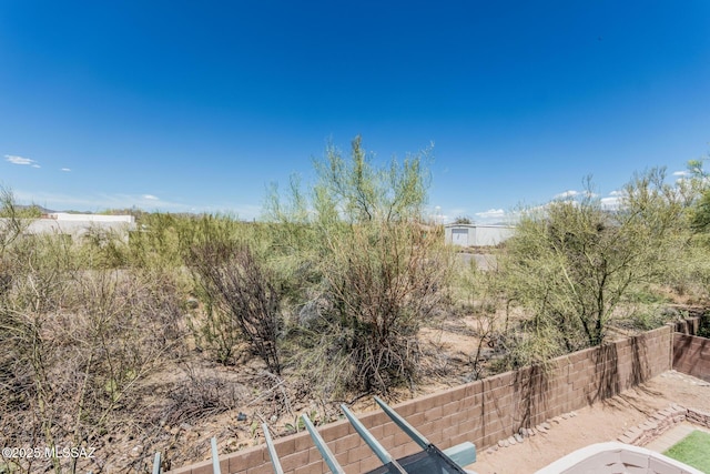 view of yard featuring fence