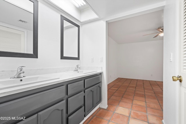 full bath featuring visible vents, a sink, a ceiling fan, and double vanity