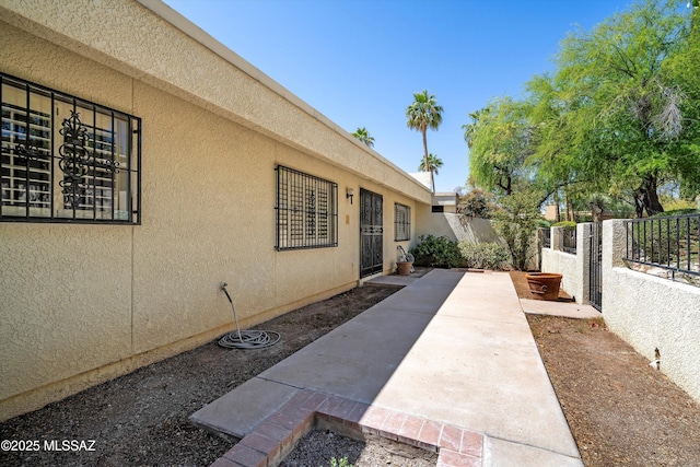 exterior space with a fenced backyard and a patio